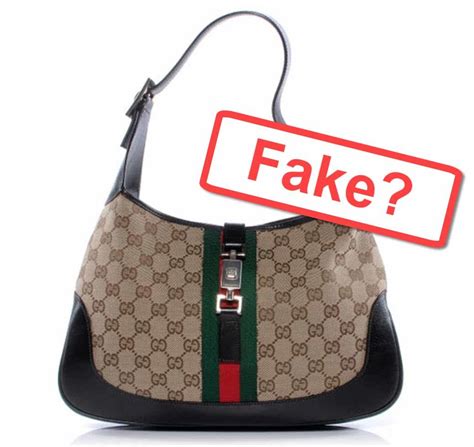 gucci falsificazione borse shopping online|Gucci bag counterfeit logo.